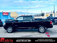 The 2022 Ram 2500 Laramie 4x4 Crew Cab with a 6'4in. box is a heavy-duty truck featuring a 6.4L V8 e... (image 2)