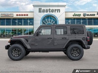 This Jeep Wrangler has a trusty Regular Unleaded V-6 3.6 L/220 engine powering this Automatic transm... (image 2)
