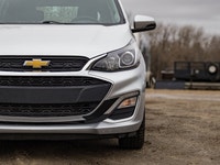 This Chevrolet is a compact and efficient car that is perfect for city driving, commuting, and anyon... (image 3)