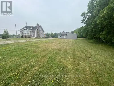 Welcome to this 3 bedroom 1.5 story farm house with all the charm and modern amenities. Featuring a...