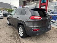 HERE IS A NICE CLEAN WELL MAINTAINED RUST FREE JEEP THAT LOOKS AND DRIVES GREAT AND SOLD CERTIFIED C... (image 5)