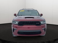 Experience the ultimate fusion of muscle-car attitude and three-row utility in this aggressive SUV,... (image 6)
