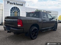 Feel the surge of a legendary *5.7L Hemi V8 engine* under your command with this striking *2023 Ram... (image 5)