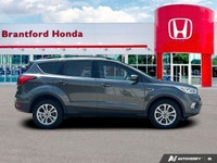 Confident command meets exceptional convenience in this superb gray 2019 Ford Escape SEL sport utili... (image 7)