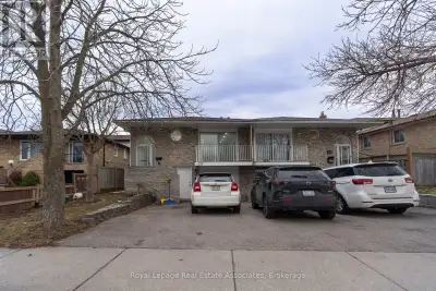 Spacious and Upgraded semi-detached 5-level backsplit. This move-in ready home features a walk-out l...