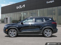 Navigate Canadian roads with confidence and style in this stunning Black 2023 Kia Seltos EX Sport Ut... (image 2)