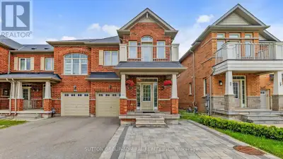 Stunning 4+1 Bedroom End-Unit Townhome in Prestigious Jefferson!Spacious open-concept layout filled...