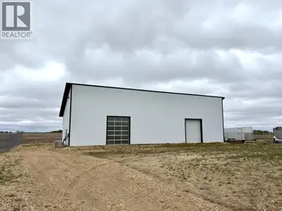 Now this is a SHOP!! On this 110'x130' lot in the Village of Rosalind you will find a new 2400 sqft...