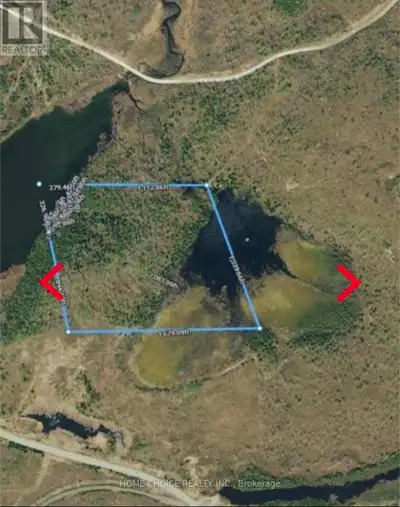 DISCOVER THE FREEDOM OF THE NORTH. Welcome to 45 acres of pristine waterfront located in an Unorgani...