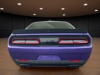 The 2023 Dodge Challenger SRT Hellcat Jailbreak in a stunning purple hue captivates with its rear-wh... (image 6)