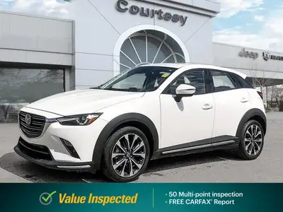 Clean Carfax! Experience precision and luxury seamlessly integrated in this exquisite 2021 Mazda CX-...