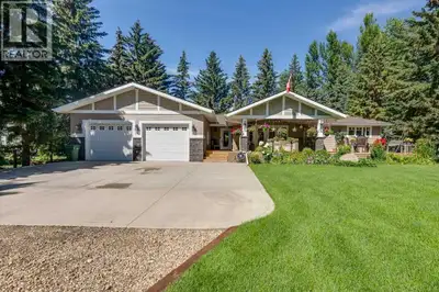 Picture sunlit mornings on your covered deck, Gull Lake's tranquil shores mere steps away, inviting...