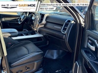 The 2023 Ram 2500 Laramie, in a striking black finish and equipped with a robust 4x4 drivetrain, pro... (image 8)