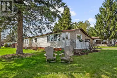 Charming Waterfront Retreat in White Lake Park Community. Welcome to your serene escape in the heart...