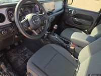 This Jeep Wrangler has a strong Regular Unleaded V-6 3.6 L/220 engine powering this Manual transmiss... (image 6)