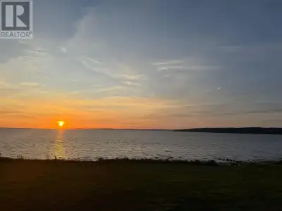 Magnificent 2.3 acre building lot on the Bay of Fundy with nature saltmarsh frontage; with pebble be...