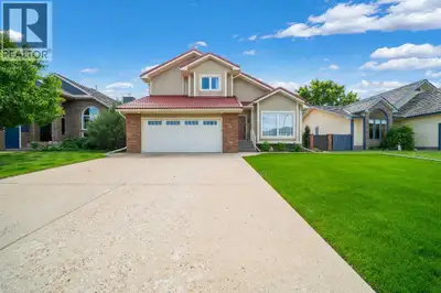 Pride of ownership is evident throughout this beautifully maintained 1.5 storey, fully developed hom...
