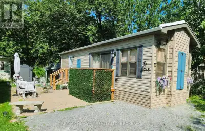 Welcome to your year round doll house. This 2021 modular home is better than new. It has been profes...