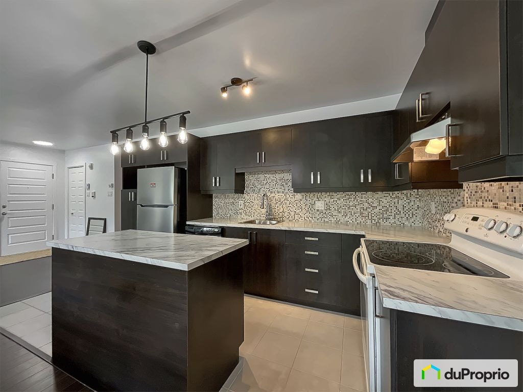 $339,000 - Condominium in Pointe-Aux-Trembles / East Montreal — photo 2