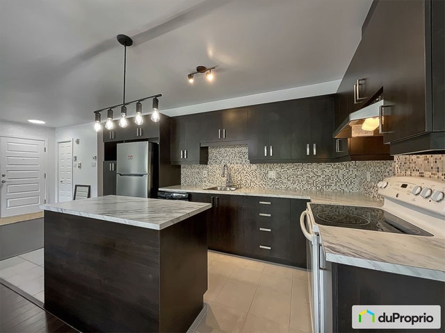 $339,000 - Condominium in Pointe-Aux-Trembles / East Montreal — photo 2