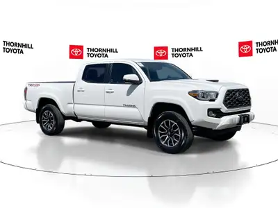 Thornhill Toyota Proudly Presents This White 2023 Toyota Tacoma 4X4 V6 with TRD SPORT Package, Featu...