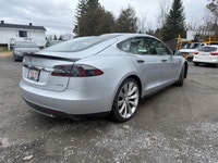 Experience the exceptional performance of the 2015 Tesla Model S P85D, a stunning silver AWD sedan r... (image 4)