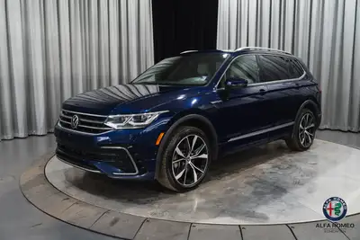 The 2022 Volkswagen Tiguan R-Line delivers sporty styling with premium comfort and everyday practica...