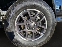 This Jeep Wrangler has a strong Gas/Electric V-6 3.6 L/220 engine powering this Automatic transmissi... (image 6)