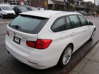 ALL WHEEL DRIVE WAGON. FINISHED IN ARTIC WHITE WITH BLACK LEATHER INTERIOR. ALLY WHEELS WITH NEW TIR... (image 3)