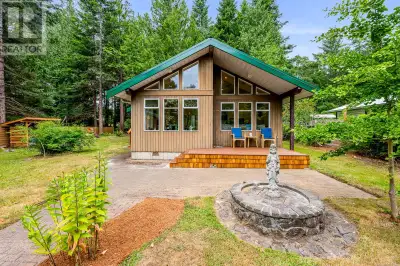Sweet and stylish beach house - this fully renovated Denman Island hideaway just a 5-minute stroll f...