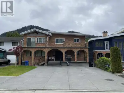 Three story home with a 2 bedroom suite (legal), 1 bedroom (unauthorized) suite draws income for a m...