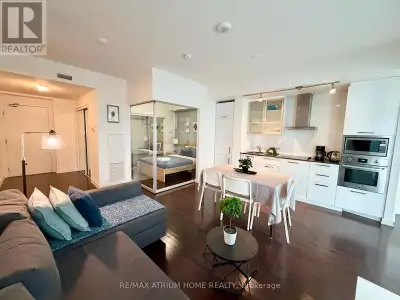 Bright & Spacious 3-Bedroom Unit with Direct Access to P.A.T.H. and Union Station.Total 934 Sqft of...