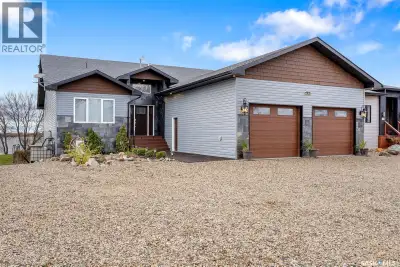 Lakefront Executive Style home at Humboldt Lake! Welcome to this stunning lakefront executive bungal...