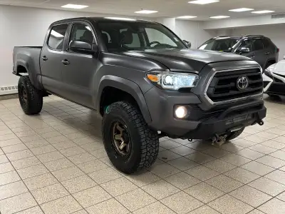Among midsize pickups that talk tough but feel soft when the work gets real, this 2021 Toyota Tacoma...