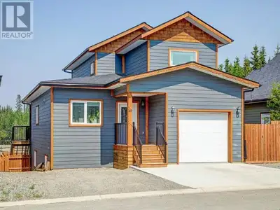 Newer Porter Creek family home in Crocus Glen with attached garage. Quality construction with modern...