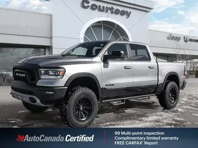 Dominate every road and task in this robust 2021 Ram 1500 Rebel Crew Cab Pickup. Dressed in striking...
