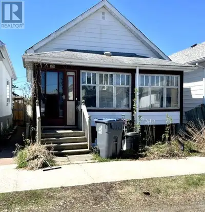 Not a drive by - check out this quaint 3-bedroom bungalow with a fenced backyard where you can BBQ i...