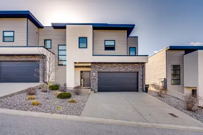 Revel in the outstanding lake and mountain panoramic views that the superb location of this contempo...