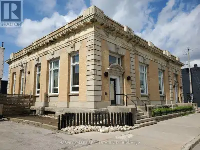 Superb Classic Structure in the centre of Simcoe, next to City Hall square. Single high ceiling open...