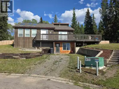 Amazing location on a massive 18,513sq' lot! This unique 4-level split home boasts vaulted ceilings,...