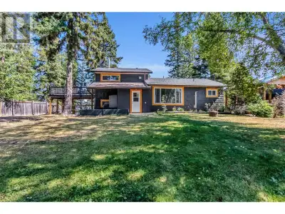 Discover 5040 Meier Sub Road, a stunning year-round retreat on the tranquil shores of Cluculz Lake....