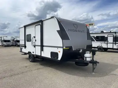 Keystone Hideout Mini travel trailer 166RB highlights: Full Rear Bath Front Olympic RV Queen Bed 3.3...