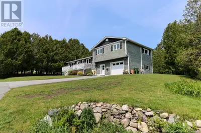 Spacious 4-Bedroom Home on 1/3 Acre East Side Convenience with a Country Feel. Welcome to 104 Asied...