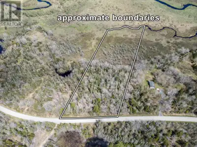 5.88 acres of land with a creek at the rear of the property. Nice setting for a home with mature tre...