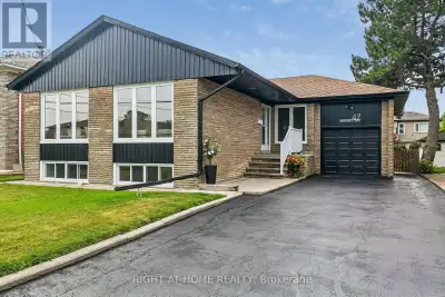 Rare opportunity to own this solid brick and stone bungalow on a premium 50.37 x 132.65 ft south-fac...