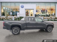This Toyota Tacoma boasts a Intercooled Turbo Regular Unleaded I-4 2.4 L/146 engine powering this Au... (image 5)