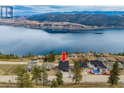4-BEDROOM + DEN, 5-BATHROOM, THREE-LEVEL HOME WITH STUNNING LAKE VIEWS ON EVERY LEVEL! The airy main...