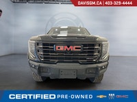 The 2023 GMC Sierra 1500 AT4X Crew Cab Short Box 4WD represents the ultimate expression of off-road... (image 1)