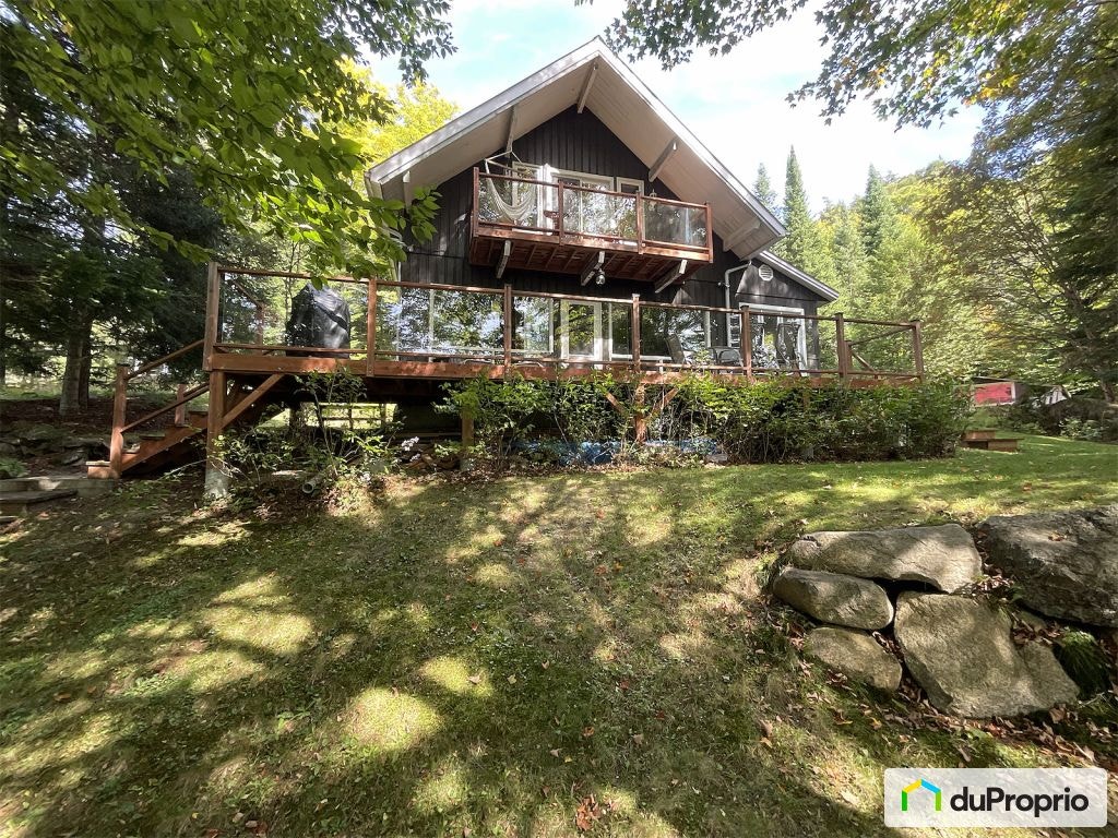 $639,000 - Cottage for sale in Montcalm — photo 1