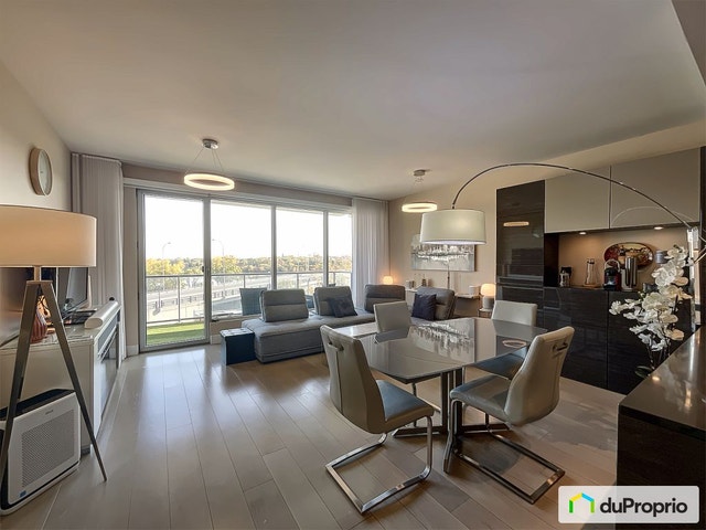 $599,000 - Condominium for sale in Laval-des-Rapides — photo 1
